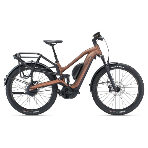 Zijaanzicht van de Giant Stormguard E+ 1 (2023) full-suspension e-bike met zwevende bagagedrager, Gates riemaandrijving en krachtige middenmotor.